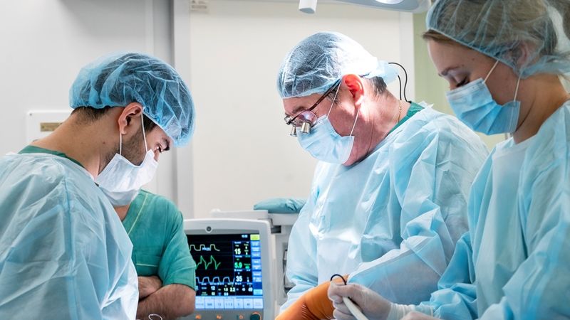 Vascular surgery team preparing patient for procedure